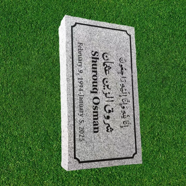 grey granite flat headstone marker