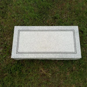 single gray granite memorial grave marker