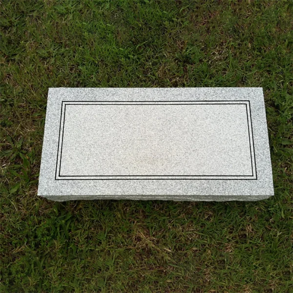 single gray granite memorial grave marker